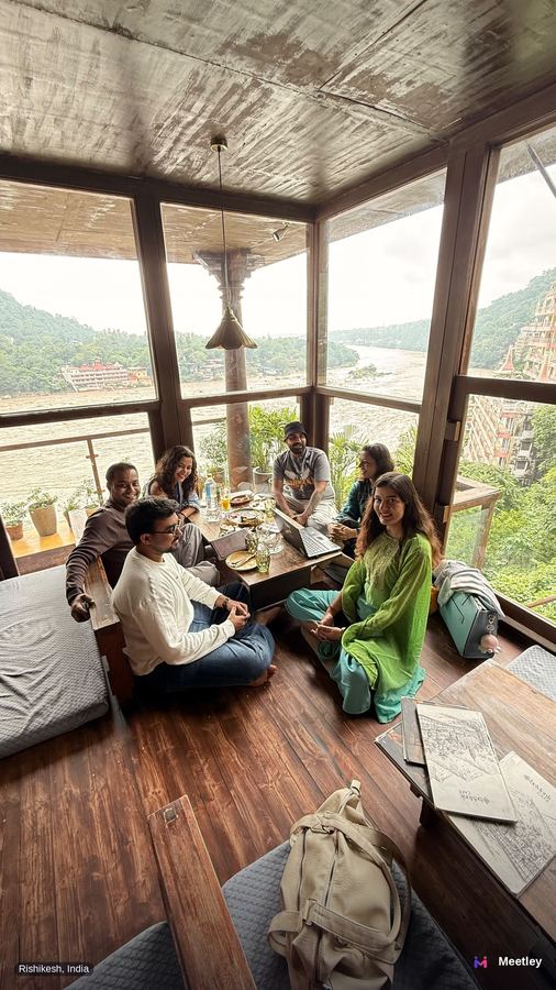 Meetley members at a riverside café in Rishikesh